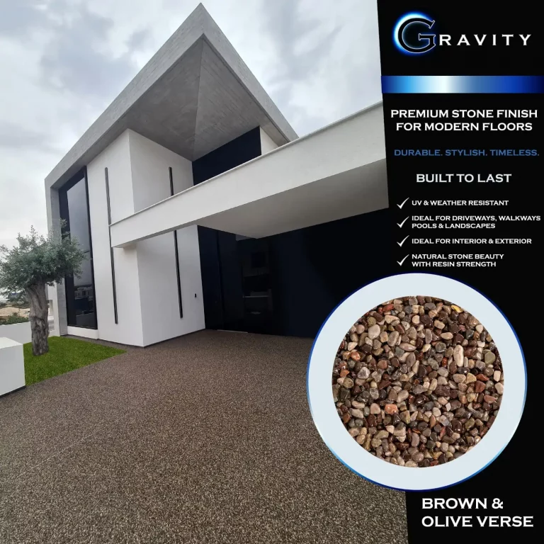 Premium Brown & Olive Verse Gravity Resin Quartz driveway finish on a modern white house, highlighting UV resistance and natural stone beauty.